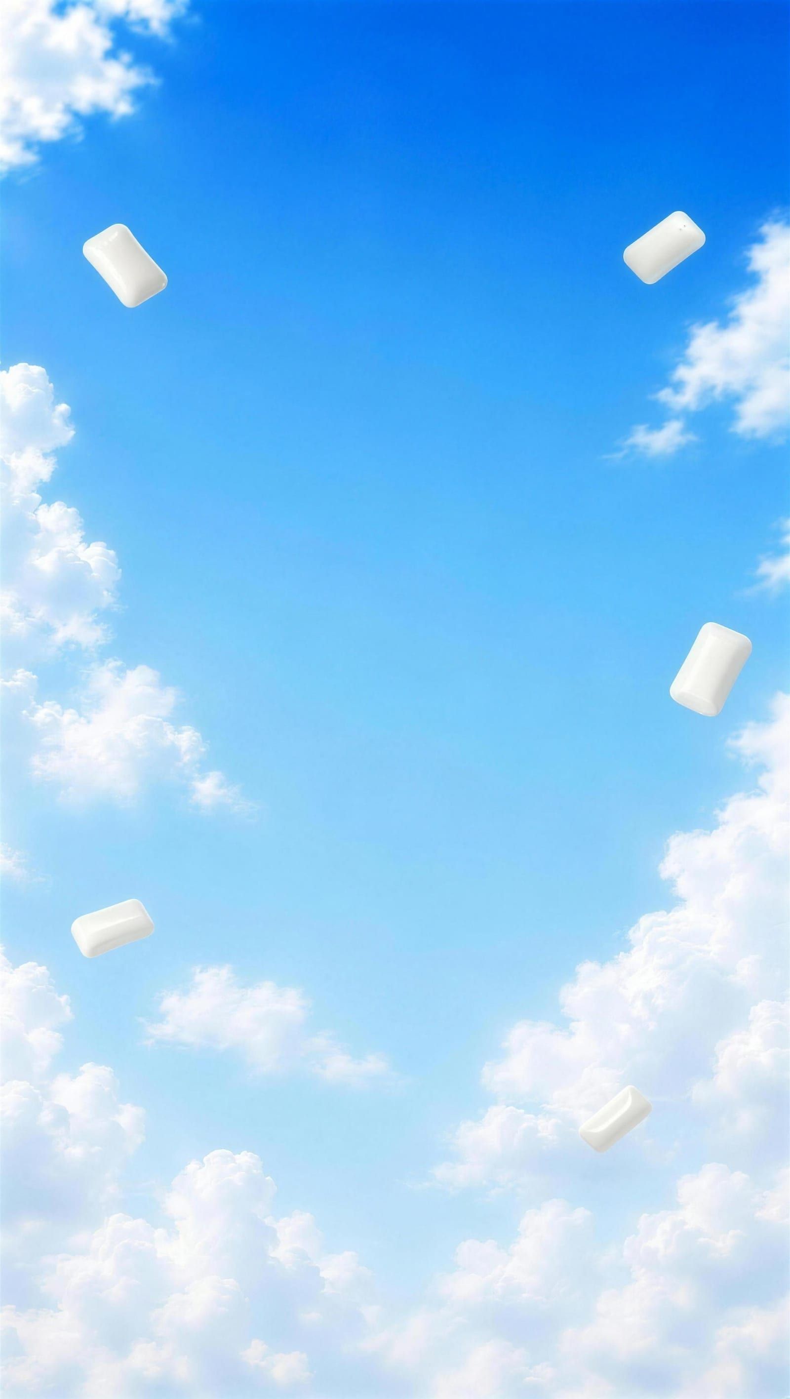 Abitagum focus gum pieces floating in a bright blue sky